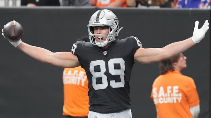 Dec 7, 2025; Paradise, Nevada, USA;  Las Vegas Raiders tight end Brock Bowers (89) reacts after catching a touchdown against the Denver Broncos during the first half at Allegiant Stadium. Mandatory Credit: Kirby Lee-Imagn Images