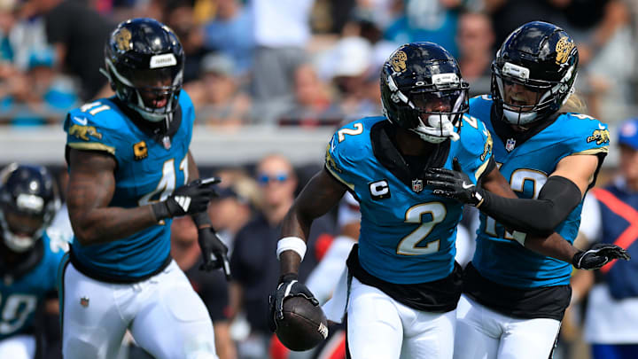 Jacksonville Jaguars cornerback Jourdan Lewis (2) celebrates his interception with safety Andrew Wingard (42), right, and defensive end Josh Hines-Allen (41), left, during the fourth quarter of an NFL football matchup at EverBank Stadium, Sunday, Sept. 21, 2025, in Jacksonville, Fla. The Jaguars defeated the Texans 17-10. Jacksonville Jaguars cornerback Jourdan Lewis (2) celebrates his interception with safety Andrew Wingard (42), right, and defensive end Josh Hines-Allen (41), left, during the fourth quarter of an NFL football matchup at EverBank Stadium, Sunday, Sept. 21, 2025, in Jacksonville, Fla. The Jaguars defeated the Texans 17-10.