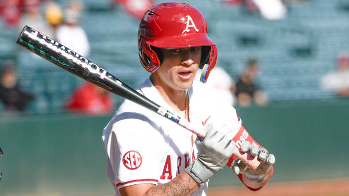 Arkansas Razorbacks designated hitter Kuhio Aloy looks at a pitch against the Louisiana-Monroe Warhawks at Baum-Walker Stadium in Fayetteville, Ark.