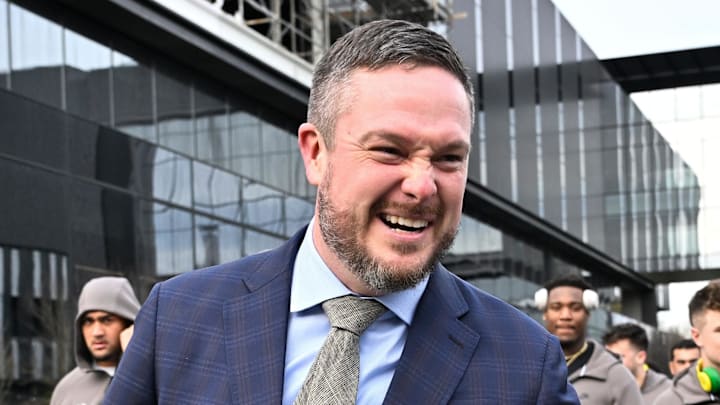 Dec 20, 2025; Eugene, OR, USA;  Oregon Ducks head coach Dan Lanning greets fans before the game against the James Madison Dukes at Autzen Stadium. Mandatory Credit: Craig Strobeck-Imagn Images