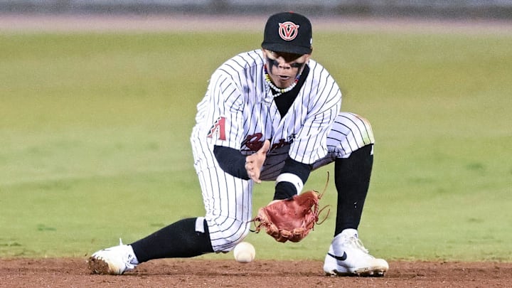 Visalia Rawhide's Cristofer Torin plays shortstop against San Jose Giants on Tuesday, April 9, 2024 for their opening home game. Visalia Rawhide's Cristofer Torin plays shortstop against San Jose Giants on Tuesday, April 9, 2024 for their opening home game.