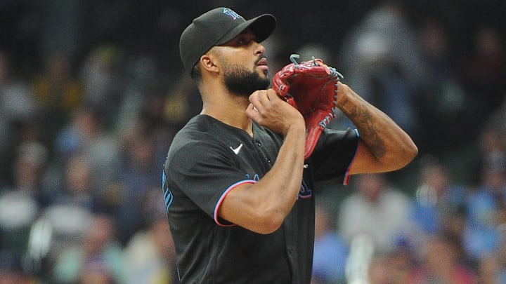 Sep 30, 2022; Milwaukee, Wisconsin, USA; Miami Marlins starting pitcher Sandy Alcantara (22) looks at the sign before delivering a pitch against the Milwaukee Brewers in the fifth inning at American Family Field. Mandatory Credit: Michael McLoone-Imagn Images Sep 30, 2022; Milwaukee, Wisconsin, USA; Miami Marlins starting pitcher Sandy Alcantara (22) looks at the sign before delivering a pitch against the Milwaukee Brewers in the fifth inning at American Family Field. Mandatory Credit: Michael McLoone-Imagn Images
