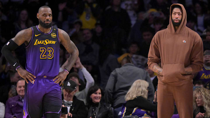 Jan 2, 2025; Los Angeles, California, USA;   Los Angeles Lakers forward LeBron James (23), forward Anthony Davis (3) and forward Jarred Vanderbilt (2) look on in the fourth quarter against the Portland Trail Blazers at Crypto.com Arena. Mandatory Credit: Jayne Kamin-Oncea-Imagn Images
