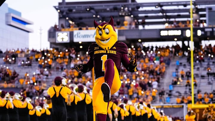 Aug 30, 2025; Tempe, Arizona, USA; Sparky the Sun Devil takes the field pregame between Arizona State Sun Devils and Northern Arizona Lumberjacks at Mountain America Stadium. Mandatory Credit: Arianna Grainey-Imagn Images Aug 30, 2025; Tempe, Arizona, USA; Sparky the Sun Devil takes the field pregame between Arizona State Sun Devils and Northern Arizona Lumberjacks at Mountain America Stadium. Mandatory Credit: Arianna Grainey-Imagn Images