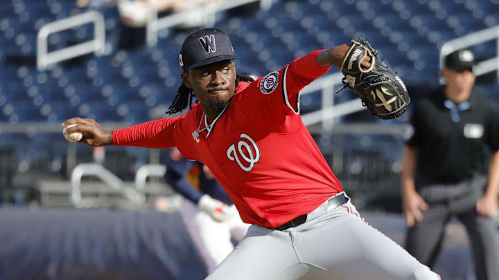 Feb 22, 2025; West Palm Beach, Florida, USA; Washington Nationals right hand pitcher Marquis Grissom Jr. throws a pitch in the ninth inning against the Houston Astros at CACTI Park of the Palm Beaches.