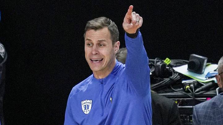 TCU Horned Frogs guard Brock Harding (2) passes near Duke Blue Devils head coach Jon Scheyer March 21, 2026 during the NCAA Men’s Basketball Tournament second round East Region game at the Bon Secours Wellness Arena in Greenville, South Carolina. TCU Horned Frogs guard Brock Harding (2) passes near Duke Blue Devils head coach Jon Scheyer March 21, 2026 during the NCAA Men’s Basketball Tournament second round East Region game at the Bon Secours Wellness Arena in Greenville, South Carolina.