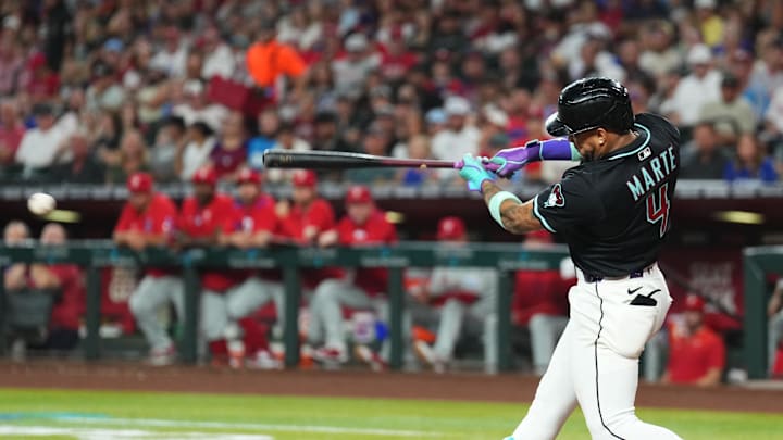 Sep 20, 2025; Phoenix, Arizona, USA; Arizona Diamondbacks second base Ketel Marte (4) hits an RBI single against the Philadelphia Phillies during the third inning at Chase Field. Mandatory Credit: Joe Camporeale-Imagn Images Sep 20, 2025; Phoenix, Arizona, USA; Arizona Diamondbacks second base Ketel Marte (4) hits an RBI single against the Philadelphia Phillies during the third inning at Chase Field. Mandatory Credit: Joe Camporeale-Imagn Images