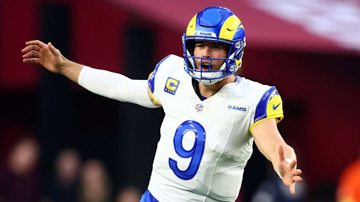Dec 7, 2025; Glendale, Arizona, USA; Los Angeles Rams quarterback Matthew Stafford (9) reacts against the Arizona Cardinals during the second half at State Farm Stadium. Mandatory Credit: Mark J. Rebilas-Imagn Images