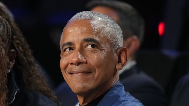 Former President Barack Obama looks on before the start of the 75th NBA All-Star Game