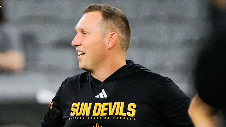 Sep 13, 2025; Tempe, Arizona, USA; Texas State Bobcats head coach G. J. Kinne and Arizona State Sun Devils head coach Kenny Dillingham speak before the game between Arizona State Sun Devils and Texas State Bobcats. Mandatory Credit: Arianna Grainey-Imagn Images