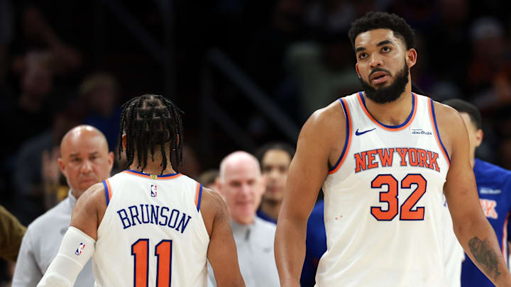 Jan 9, 2026; Phoenix, Arizona, USA; New York Knicks center Karl-Anthony Towns (32) and guard Jalen Brunson (11) against the Phoenix Suns at Mortgage Matchup Center. Mandatory Credit: Mark J. Rebilas-Imagn Images
