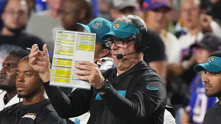 Sep 23, 2024; Orchard Park, New York, USA; Jacksonville Jaguars head coach Doug Pederson looks at his play card during the first half against the Buffalo Bills at Highmark Stadium. Mandatory Credit: Gregory Fisher-Imagn Images