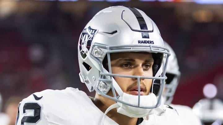 Aug 23, 2025; Glendale, Arizona, USA; Las Vegas Raiders quarterback Aidan O'Connell (12) against the Arizona Cardinals during a preseason NFL game at State Farm Stadium. Mandatory Credit: Mark J. Rebilas-Imagn Images