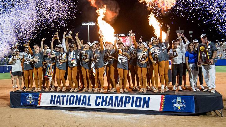 Texas Longhorns players and coaches pose for a group photo after defeating the Texas Tech Red Raiders to win the NCAA Women’s College World Series championship series. Texas Longhorns players and coaches pose for a group photo after defeating the Texas Tech Red Raiders to win the NCAA Women’s College World Series championship series.