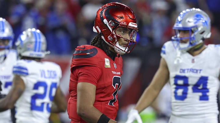 Nov 10, 2024; Houston, Texas, USA; Houston Texans quarterback C.J. Stroud (7) walks off the field after a play during the fourth quarter against the Detroit Lions at NRG Stadium. Mandatory Credit: Troy Taormina-Imagn Images