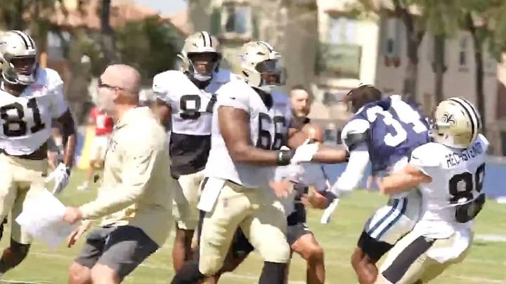 Saints wide receiver Brock Rechsteiner takes down Jaylen Thomas
