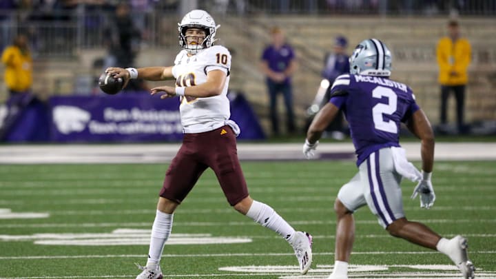 Nov 16, 2024; Manhattan, Kansas, USA; Arizona State Sun Devils quarterback Sam Leavitt (10) drops back to pass against Kansas State Wildcats safety Colby McCalister (2) during the second quarter at Bill Snyder Family Football Stadium. Mandatory Credit: Scott Sewell-Imagn Images