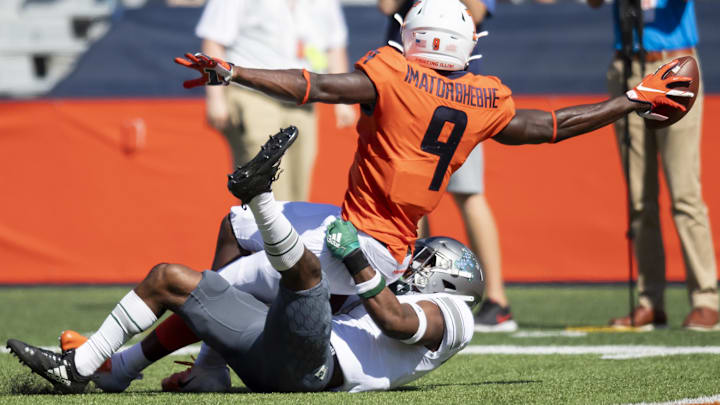 llinois Fighting Illini WR Josh Imatorbhebhe (9) catches a pass for a touchdown against EMU CB Freddie McGee III (7)