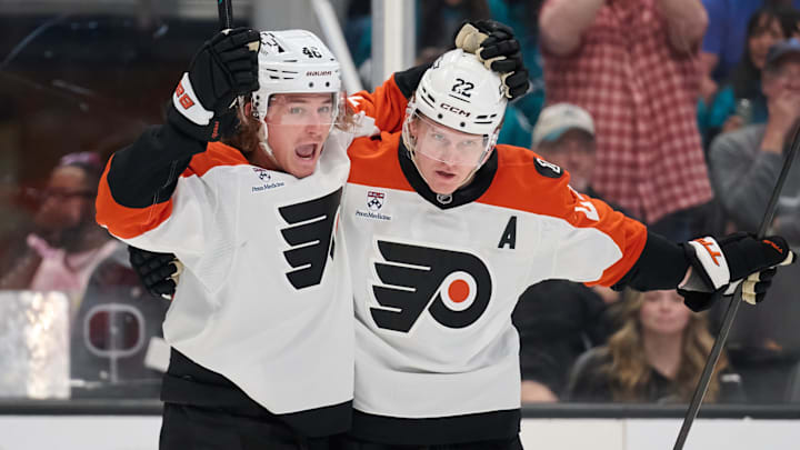 Mar 21, 2026; San Jose, California, USA; Philadelphia Flyers center Christian Dvorak (22) celebrates with center Trevor Zegras (46) after scoring the eventual game-winning goal against the San Jose Sharks during the third period at SAP Center at San Jose. Mandatory Credit: Robert Edwards-Imagn Images