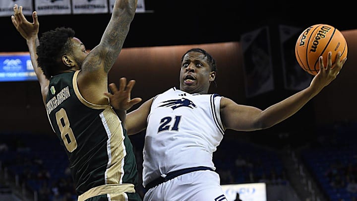 Nevada’s Justin McBride shoots while taking on Colorado State at Lawlor Events Center in Reno on Dec. 21, 2024.