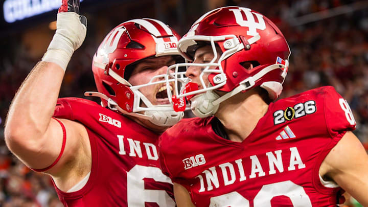 Indiana's Charlie Becker (80) celebrates with Carter Smith (65) during the National Championship at Hard Rock Stadium in Miami Gardens on Monday, Jan. 19, 2026.
