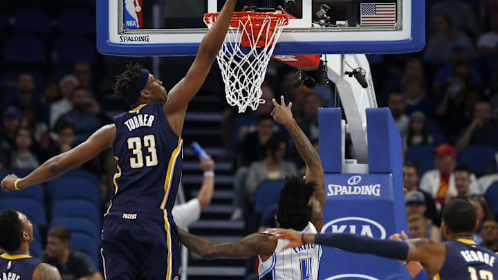 Feb 1, 2017; Orlando, FL, USA; Indiana Pacers center Myles Turner (33) blocks a shot by Orlando Magic guard Elfrid Payton (4) during the first quarter at Amway Center. Mandatory Credit: Kim Klement-Imagn Images