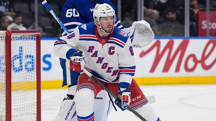 Mar 25, 2026; Toronto, Ontario, CAN; New York Rangers forward J.T. Miller (8) skates against the Toronto Maple Leafs during the second period at Scotiabank Arena. Mandatory Credit: John E. Sokolowski-Imagn Images
