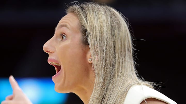 Buffalo Bulls head coach Becky Burke works the sideline during the first half of the Mid-American Conference Tournament women's championship game at Rocket Mortgage FieldHouse, Saturday, March 16, 2024, in Cleveland, Ohio.