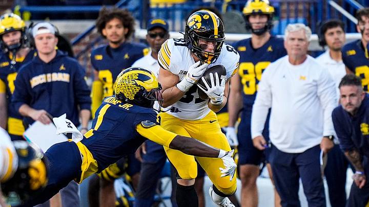 Michigan safety Rod Moore Jr. (1) tackles Iowa tight end DJ Vonnahme (81) during the second half at Michigan Stadium in Ann Arbor on Saturday, Sept. 26, 2026. Michigan safety Rod Moore Jr. (1) tackles Iowa tight end DJ Vonnahme (81) during the second half at Michigan Stadium in Ann Arbor on Saturday, Sept. 26, 2026.
