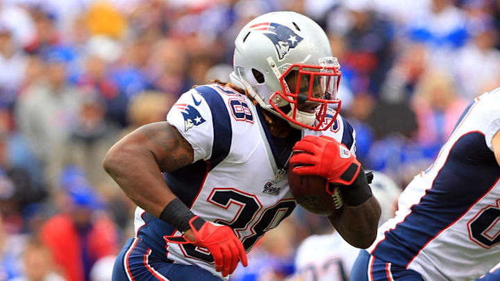 Sep 30, 2012; Orchard Park, NY, USA; New England Patriots running back Brandon Bolden (38) runs with the ball against the Buffalo Bills during the second half at Ralph Wilson Stadium. Patriots beat the Bills 52-28. Mandatory Credit: Kevin Hoffman-Imagn Images
