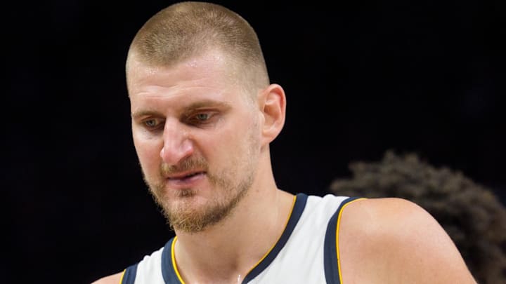 Apr 25, 2026; Minneapolis, Minnesota, USA; Denver Nuggets center Nikola Jokic (15) exits the floor after being ejected along with Minnesota Timberwolves forward Julius Randle as they both pick up double technical fouls in the fourth quarter at Target Center. Mandatory Credit: Matt Blewett-Imagn Images Apr 25, 2026; Minneapolis, Minnesota, USA; Denver Nuggets center Nikola Jokic (15) exits the floor after being ejected along with Minnesota Timberwolves forward Julius Randle as they both pick up double technical fouls in the fourth quarter at Target Center. Mandatory Credit: Matt Blewett-Imagn Images