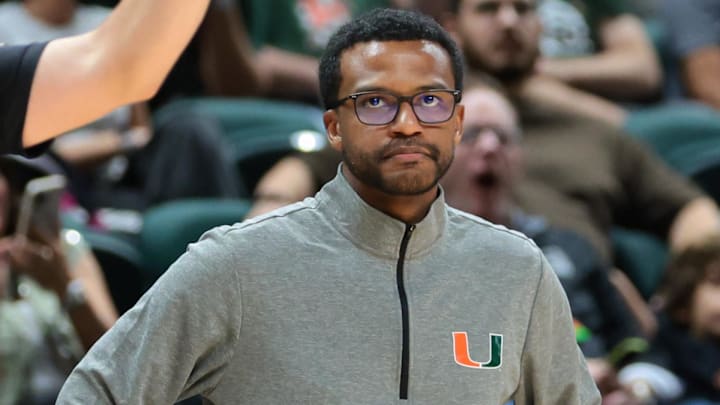 Nov 23, 2025; Coral Gables, Florida, USA; Miami Hurricanes head coach Jai Lucas watches from the sideline against the Delaware State Hornets during the second half at Watsco Center. Mandatory Credit: Sam Navarro-Imagn Images