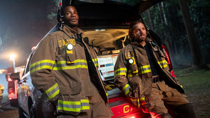 "Making Things Go Boom" -- CBS Original Series FIRE COUNTRY, scheduled to air on Friday, April 17 (9:00-10:00 PM, ET/PT). Pictured (L-R): Jordan Calloway as Jake Crawford and Max Thieriot as Bode Leone. "Making Things Go Boom" -- CBS Original Series FIRE COUNTRY, scheduled to air on Friday, April 17 (9:00-10:00 PM, ET/PT). Pictured (L-R): Jordan Calloway as Jake Crawford and Max Thieriot as Bode Leone.