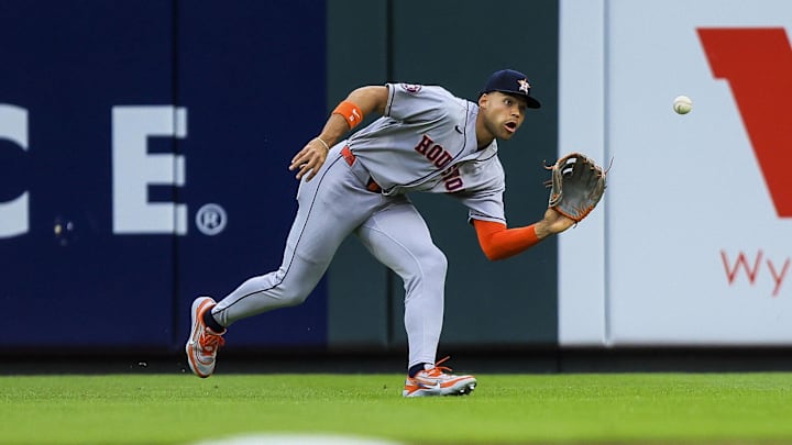 May 8, 2026; Cincinnati, Ohio, USA; Houston Astros outfielder Cam Smith (11) catches a fly out hit by Cincinnati Reds catcher Tyler Stephenson (not pictured) in the second inning at Great American Ball Park. Mandatory Credit: Katie Stratman-Imagn Images