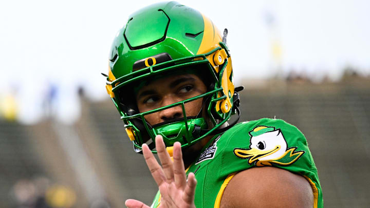 Dec 20, 2025; Eugene, OR, USA; Oregon Ducks tight end Kenyon Sadiq (18) looks on before the game against the James Madison Dukes at Autzen Stadium. Mandatory Credit: Troy Wayrynen-Imagn Images