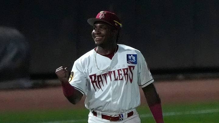Wisconsin Timber Rattlers Luis Pena (13) reacts after making a difficult throw to first base against the Quad Cities River Bandits during their baseball game Friday, July 17, 2026, at Neuroscience Group Field at Fox Cities Stadium in Grand Chute, Wisconsin. Wisconsin Timber Rattlers Luis Pena (13) reacts after making a difficult throw to first base against the Quad Cities River Bandits during their baseball game Friday, July 17, 2026, at Neuroscience Group Field at Fox Cities Stadium in Grand Chute, Wisconsin.