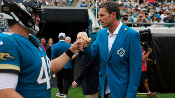 Jacksonville Jaguars hall-of-fame and former offensive tackle, Tony Boselli, fist bumps long snapper Ross Matiscik (46) during the second quarter of an NFL football matchup Sunday, Oct. 6, 2024 at EverBank Stadium in Jacksonville, Fla. Coughlin was inducted into the ring of honor at halftime. The Jaguars edged the Colts on a field goal 37-34. [Corey Perrine/Florida Times-Union]