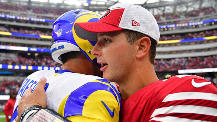 Sep 17, 2023; Inglewood, California, USA; San Francisco 49ers quarterback Brock Purdy (13) meets with Los Angeles Rams quarterback Matthew Stafford (9) following the victory at SoFi Stadium. Mandatory Credit: Gary A. Vasquez-Imagn Images