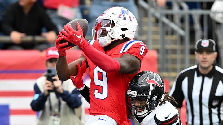 Oct 13, 2024; Foxborough, Massachusetts, USA; New England Patriots wide receiver Kayshon Boutte (9) scores a touchdown against the Houston Texans during the first half at Gillette Stadium. Mandatory Credit: Brian Fluharty-Imagn Images