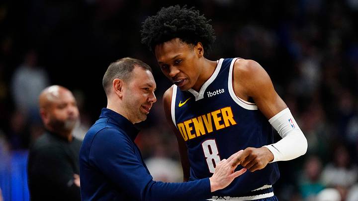 Jan 27, 2026; Denver, Colorado, USA; Denver Nuggets guard Peyton Watson (8) talks to head coach David Adelman during the first quarter against the Detroit Pistons at Ball Arena. Jan 27, 2026; Denver, Colorado, USA; Denver Nuggets guard Peyton Watson (8) talks to head coach David Adelman during the first quarter against the Detroit Pistons at Ball Arena.