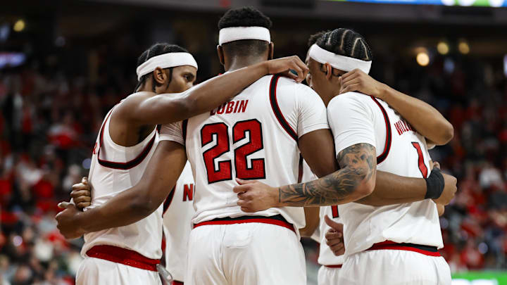 Jan 27, 2026; Raleigh, North Carolina, USA; NC State Wolfpack huddles during the first half of the game against the Syracuse Orange at Lenovo Center. Mandatory Credit: Jaylynn Nash-Imagn Images Jan 27, 2026; Raleigh, North Carolina, USA; NC State Wolfpack huddles during the first half of the game against the Syracuse Orange at Lenovo Center. Mandatory Credit: Jaylynn Nash-Imagn Images