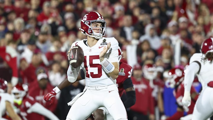 Dec 19, 2025; Norman, OK, USA; Alabama Crimson Tide quarterback Ty Simpson (15) looks to make a pass in the first half against the Oklahoma Sooners at Gaylord Family OK Memorial Stadium. Mandatory Credit: Mark J. Rebilas-Imagn Images
