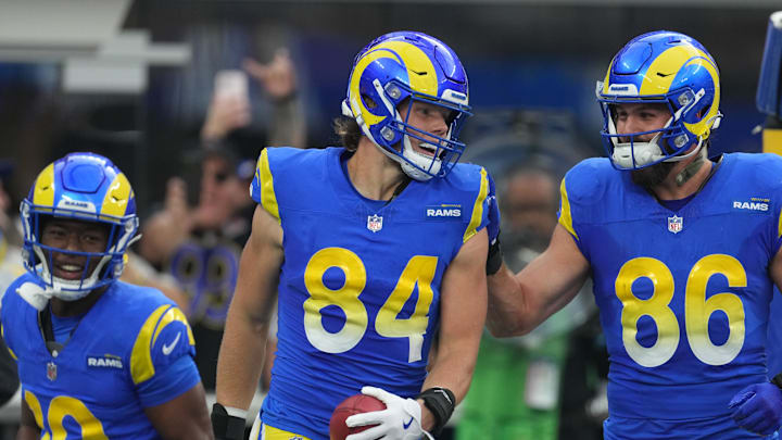 Dec 8, 2024; Inglewood, California, USA; Los Angeles Rams tight end Hunter Long (84) celebrates with wide receiver Xavier Smith (19) and tight end Colby Parkinson (86) after scoring a touchdown on a blocked punt against the Buffalo Bills in the first half at SoFi Stadium. Mandatory Credit: Kirby Lee-Imagn Images Dec 8, 2024; Inglewood, California, USA; Los Angeles Rams tight end Hunter Long (84) celebrates with wide receiver Xavier Smith (19) and tight end Colby Parkinson (86) after scoring a touchdown on a blocked punt against the Buffalo Bills in the first half at SoFi Stadium. Mandatory Credit: Kirby Lee-Imagn Images