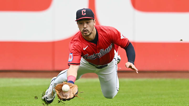 Aug 25, 2024; Cleveland, Ohio, USA; Cleveland Guardians left fielder Steven Kwan (38) catches a ball hit by Texas Rangers third baseman Ezequiel Duran (not pictured) during the third inning at Progressive Field. Mandatory Credit: Ken Blaze-Imagn Images Aug 25, 2024; Cleveland, Ohio, USA; Cleveland Guardians left fielder Steven Kwan (38) catches a ball hit by Texas Rangers third baseman Ezequiel Duran (not pictured) during the third inning at Progressive Field. Mandatory Credit: Ken Blaze-Imagn Images