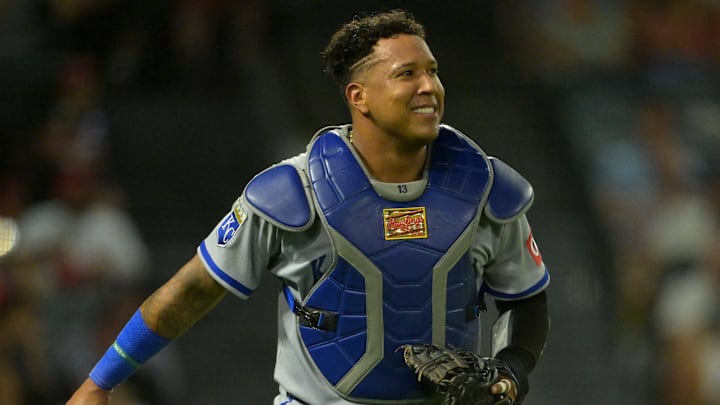Sep 23, 2025; Anaheim, California, USA;  Kansas City Royals catcher Salvador Perez (13) smiles after catching a pop foul during the third inning against the Los Angeles Angels at Angel Stadium. Mandatory Credit: Jayne Kamin-Oncea-Imagn Images