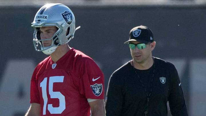 Jun 9, 2026; Henderson, NV, USA; Las Vegas Raiders quarterback Fernando Mendoza (15) and coach Klint Kubiak during minicamp at Intermountain Health Performance Center. Mandatory Credit: Kirby Lee-Imagn Images Jun 9, 2026; Henderson, NV, USA; Las Vegas Raiders quarterback Fernando Mendoza (15) and coach Klint Kubiak during minicamp at Intermountain Health Performance Center. Mandatory Credit: Kirby Lee-Imagn Images