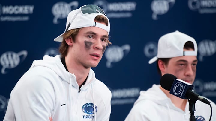 Penn State's Gavin McKenna, left, answers a question during a post-game press conference following a Big Ten hockey game against Michigan State at Beaver Stadium on January 31, 2026.