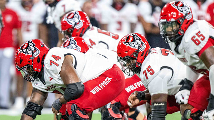 Sep 11, 2025; Winston-Salem, North Carolina, USA; North Carolina State Wolfpack offensive lineman Jalen Grant (74) lines up against Wake Forest Demon Deacons at Allegacy Federal Credit Union Stadium. Mandatory Credit: Luke Jamroz-Imagn Images Sep 11, 2025; Winston-Salem, North Carolina, USA; North Carolina State Wolfpack offensive lineman Jalen Grant (74) lines up against Wake Forest Demon Deacons at Allegacy Federal Credit Union Stadium. Mandatory Credit: Luke Jamroz-Imagn Images