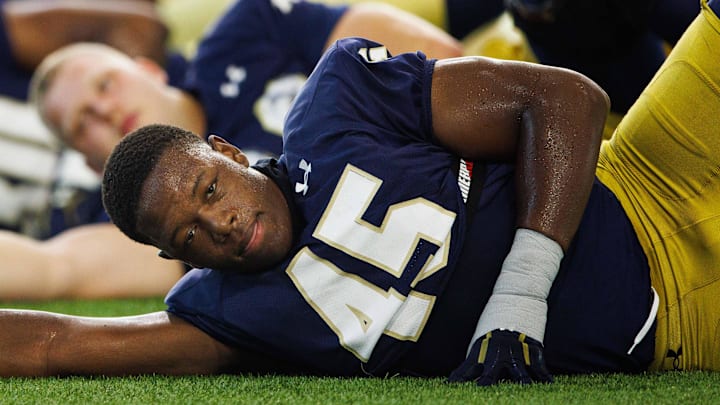 Notre Dame defensive lineman Kobi Onyiuke (45) warms up during a Notre Dame football practice at Irish Athletic Center on Thursday, Aug. 1, 2024, in South Bend.