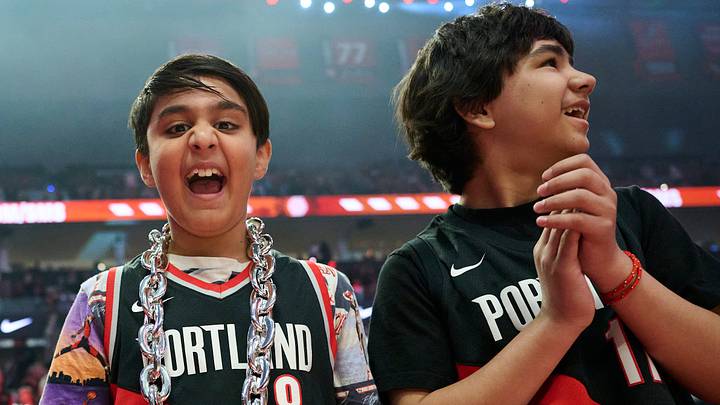 Basketball fans cheer before a game between the San Antonio Spurs and the Portland Trail Blazers during the first round of the 2026 NBA Playoffs at Moda Center. Basketball fans cheer before a game between the San Antonio Spurs and the Portland Trail Blazers during the first round of the 2026 NBA Playoffs at Moda Center.